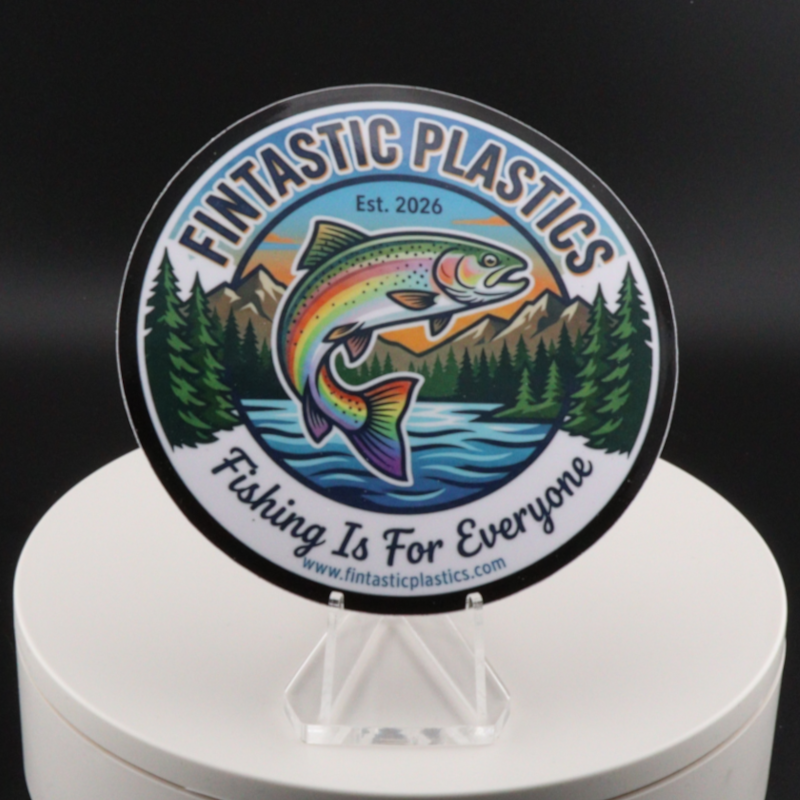 Outdoor vinyl sticker, round, colorful Fintastic Plastics logo with fish, trees, and text