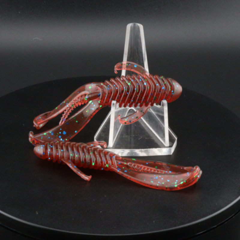 3.25-inch red glitter soft plastic creature lure pair, ribbed bodies, on clear stand