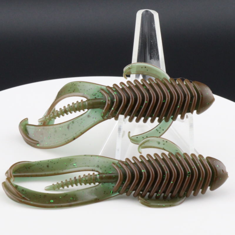 Soft plastic fishing lure set with speckled green bodies, brown ribs, visible hooks
