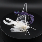 3.25-inch creature lure with white skirt and purple ribbed body, trailer tail