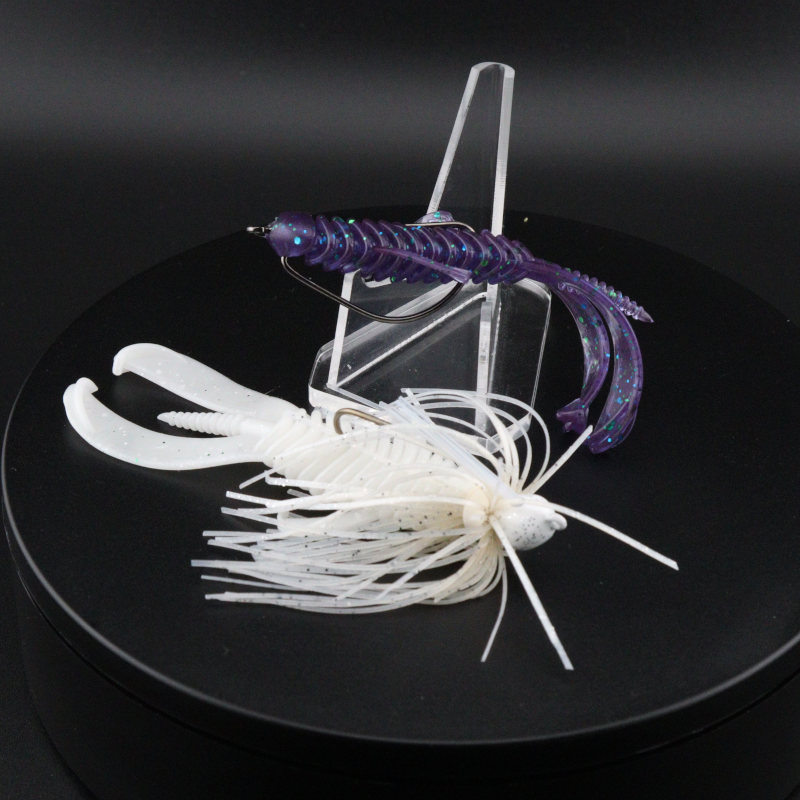 3.25-inch creature lure with white skirt and purple ribbed body, trailer tail