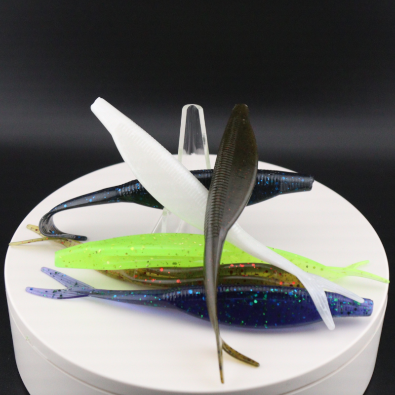 5-inch darter fluke fishing lure, blue speckled with white tail and green accents