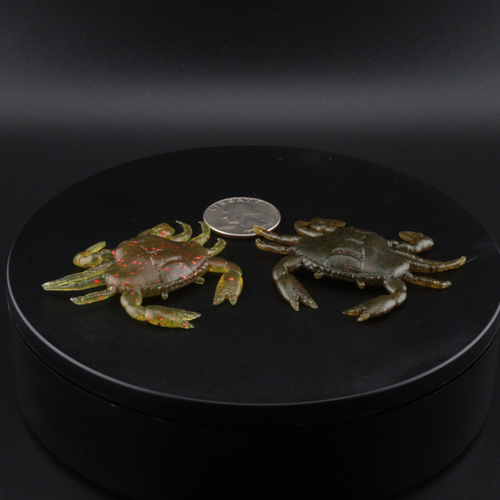 Small plastic crab lures, multicolor glitter-speckled bodies and spread claws