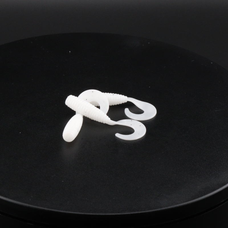 White 2-inch grub soft plastic bait with curled tail