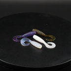 Purple-blue and white 2-inch grub soft plastic baits with curled tails