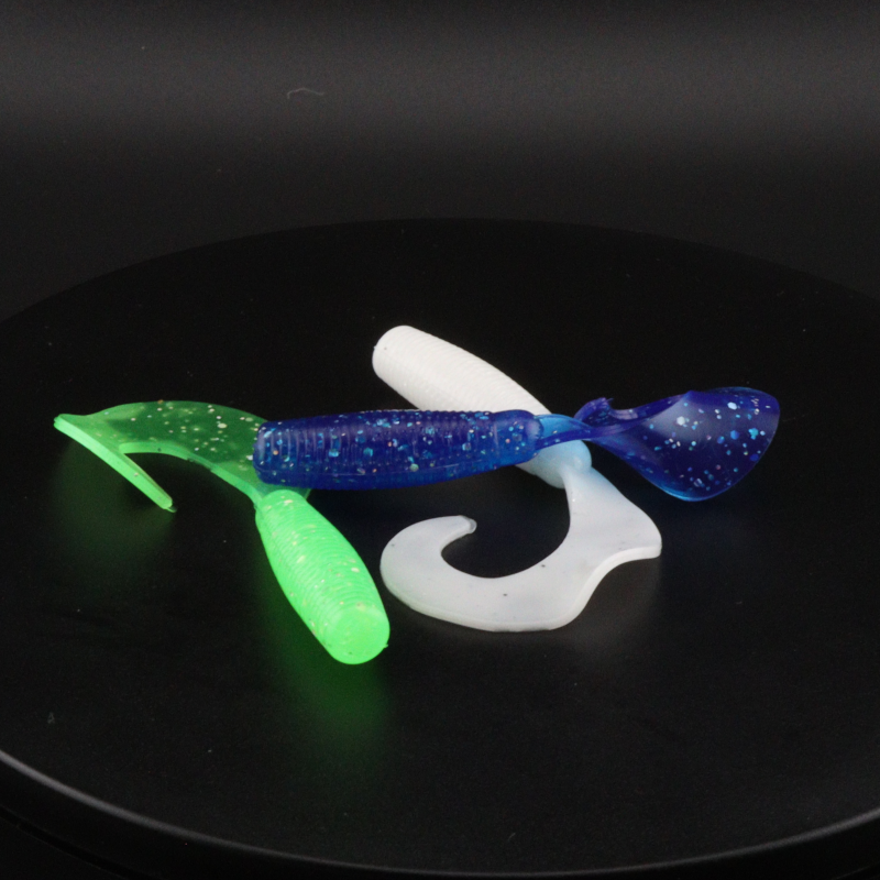 3-inch green and blue soft plastic grub worm with twin tail fins
