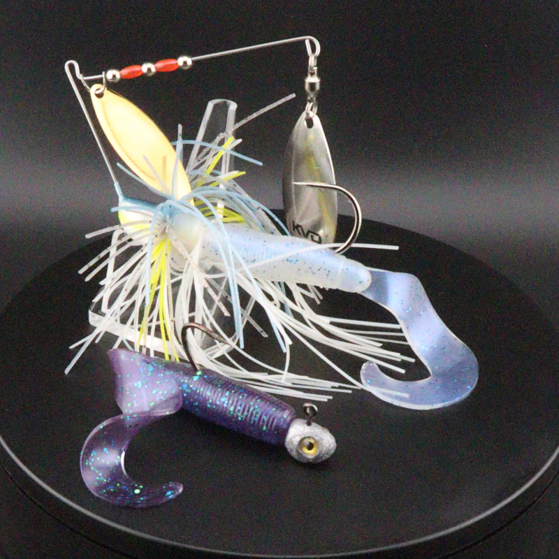 2-inch soft plastic grub fishing lure with jig head and treble hooks
