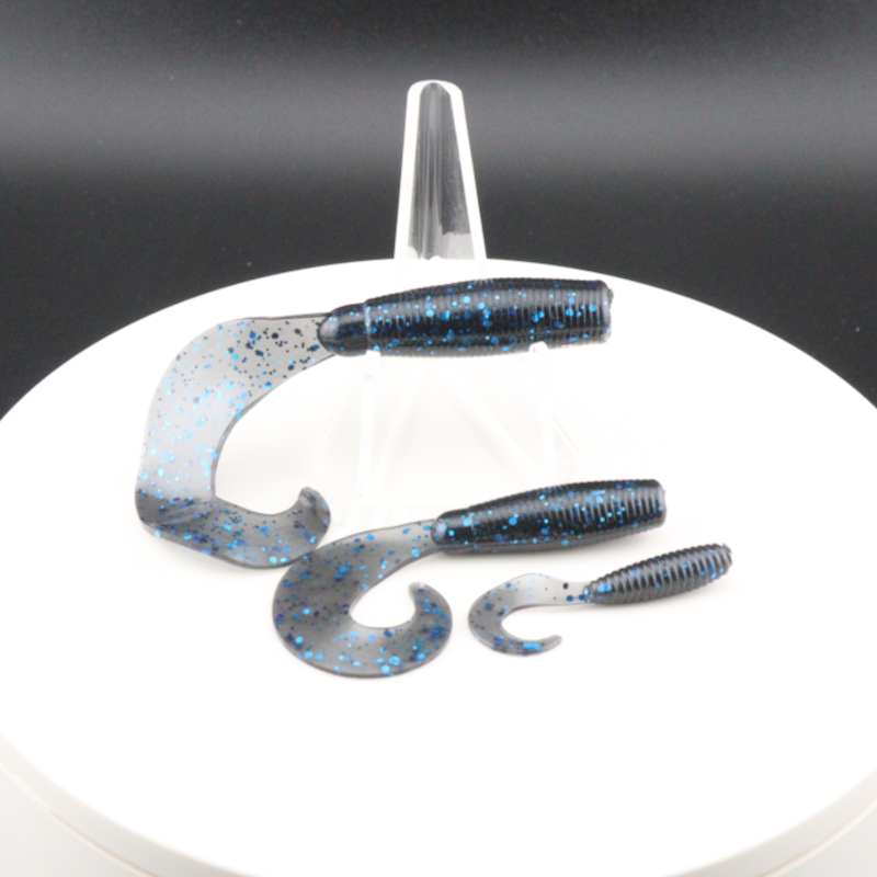 Go-to Grub soft fishing lures in blue speckled color, worm-shaped with curly tails
