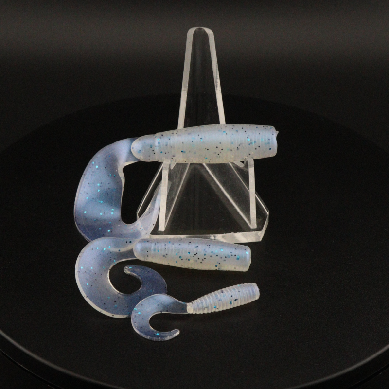 Go-to Grub soft fishing lures in light blue speckled color, worm-shaped with curly tails
