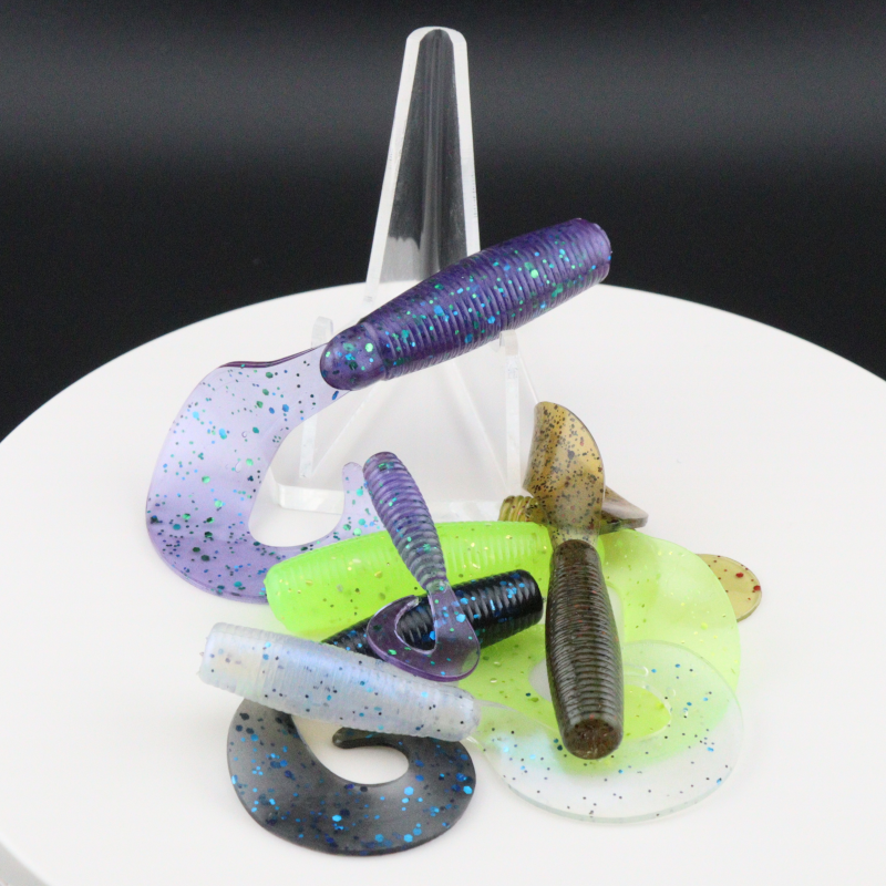 Go-to Grub soft fishing lures in mixed blue-purple and neon green speckled colors