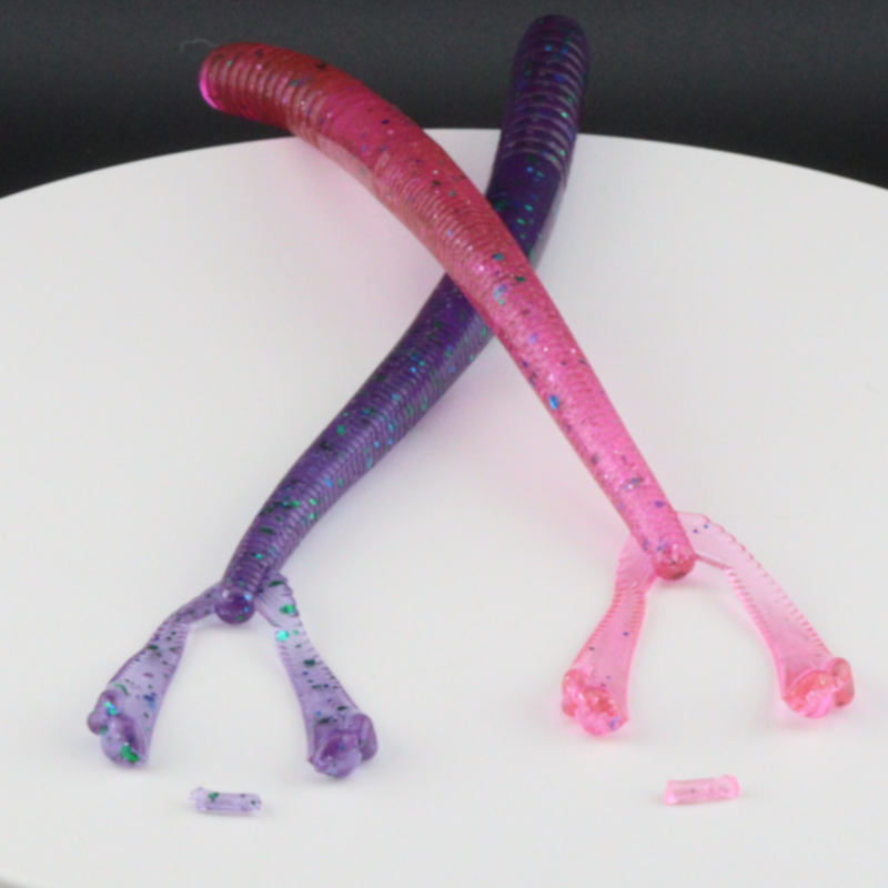 5.5in plastic fishing worm lure in pink and purple with glitter speckles