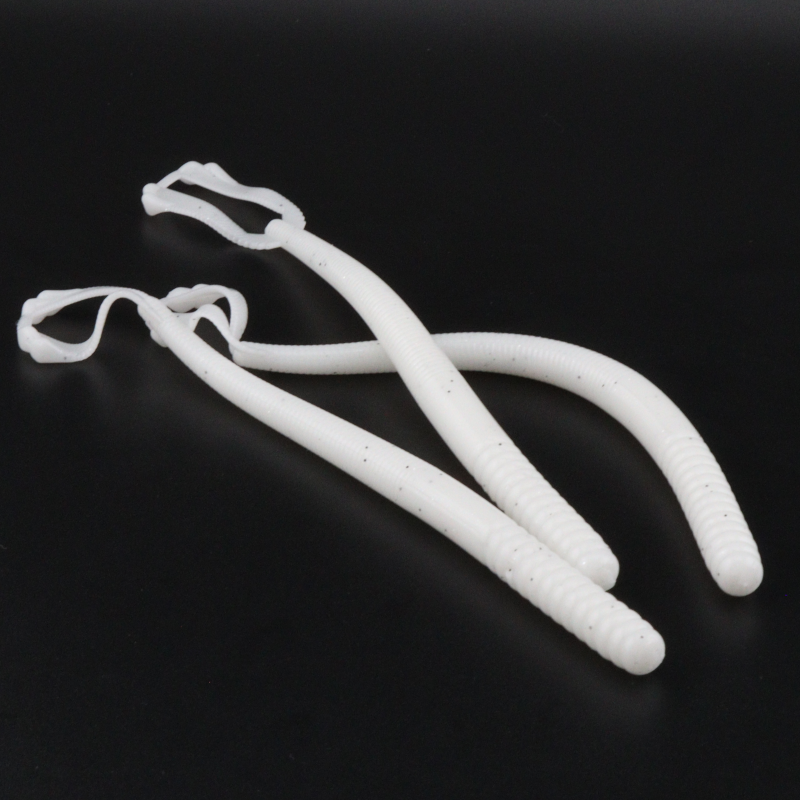 5.5in plastic fishing worm lure in white with curved worm tail