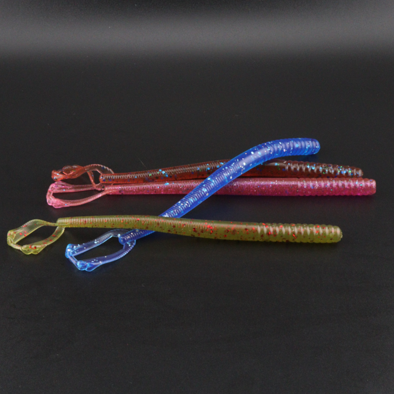 5.5in plastic fishing worm lure in red and blue with speckled finish