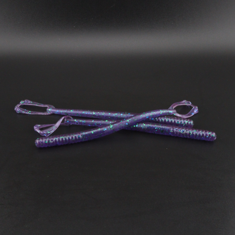 5.5in plastic fishing worm lure in purple and blue with speckled body
