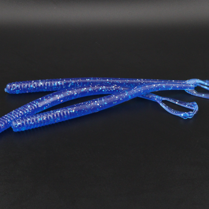 7-inch worm lure, glitter blue ribbed soft plastic with looped tail