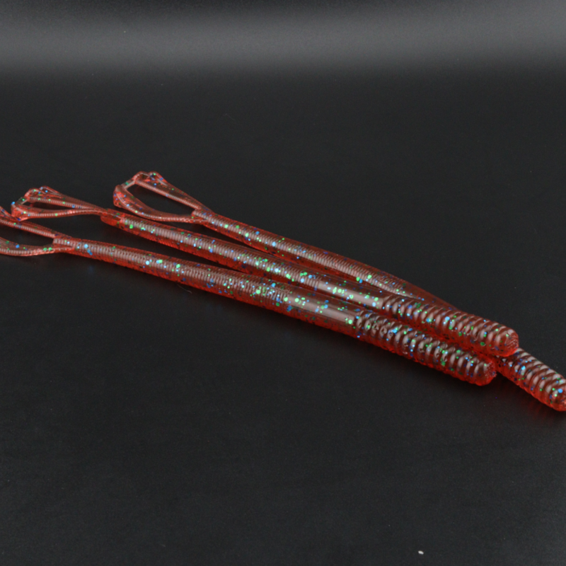 7-inch worm lure, red-brown ribbed soft plastic with rainbow speckles and curled ends