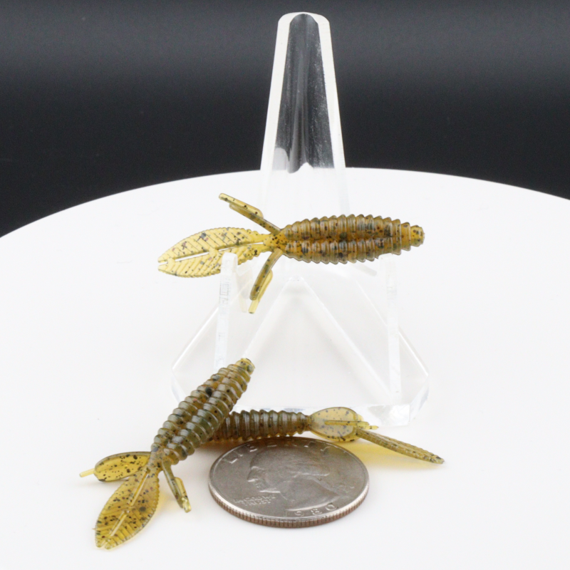 1.75 in beaver-tail fishing lure, olive-tan body with speckled winged fins