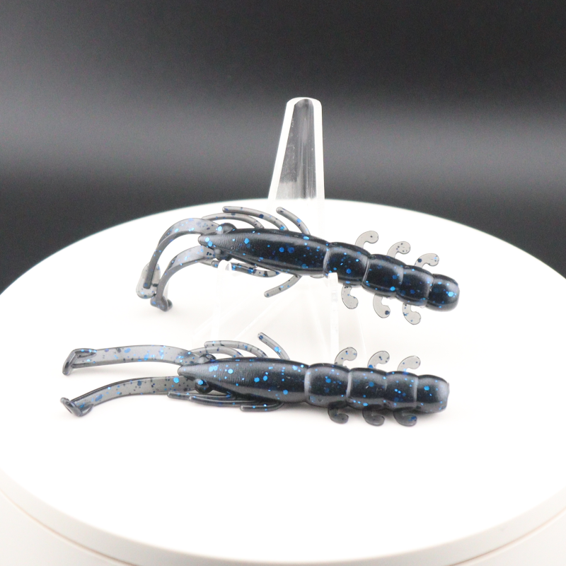 Buggy Shrimp lure, dark blue speckled body with silver fins and curled legs