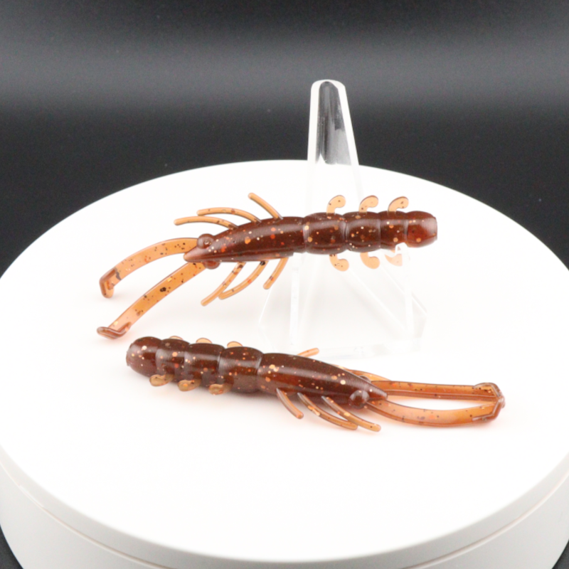 Buggy Shrimp lure, brown body with orange legs and glittery speckled details