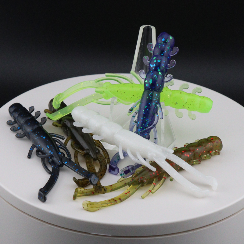 Buggy Shrimp lure set on display: light green, white, and dark blue speckled bodies