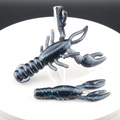 Blue and black speckled soft plastic craw bait with curled claws