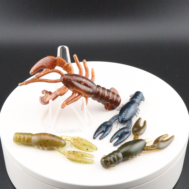 Brown and copper speckled soft plastic craw bait with long pincher claws