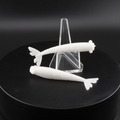 3-inch white shrimp soft baits on clear stand