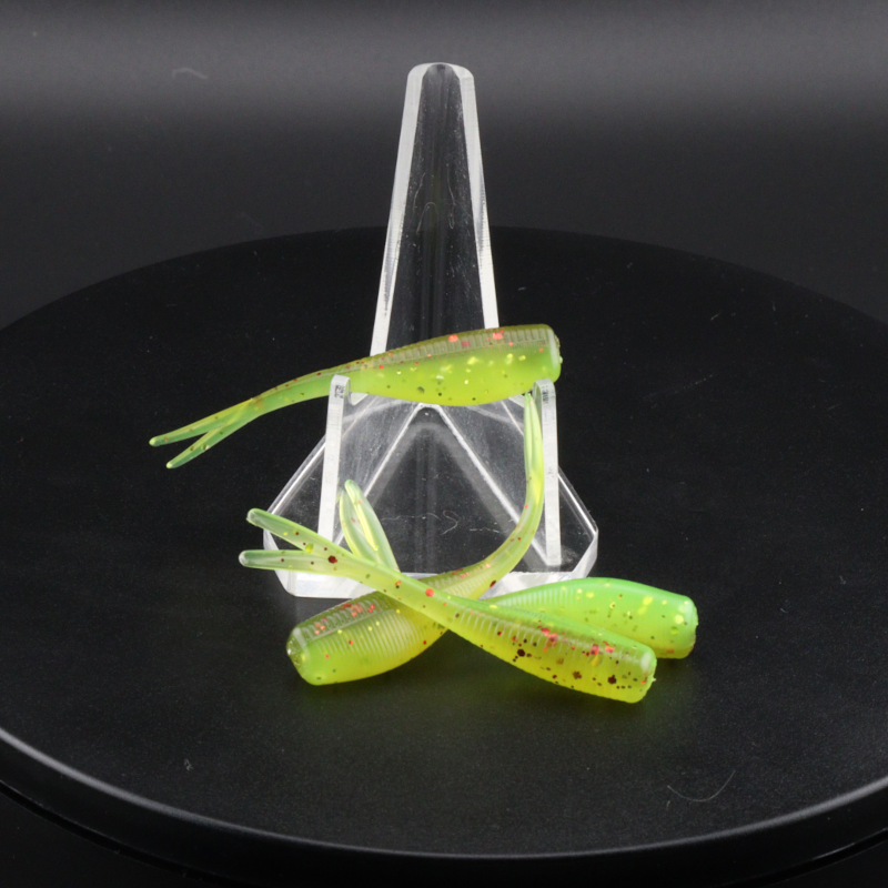 2-inch chartreuse soft plastic fishing lure with tail fins in clear holder