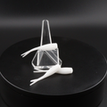 2-inch white soft plastic fishing lure with tail fins in clear holder