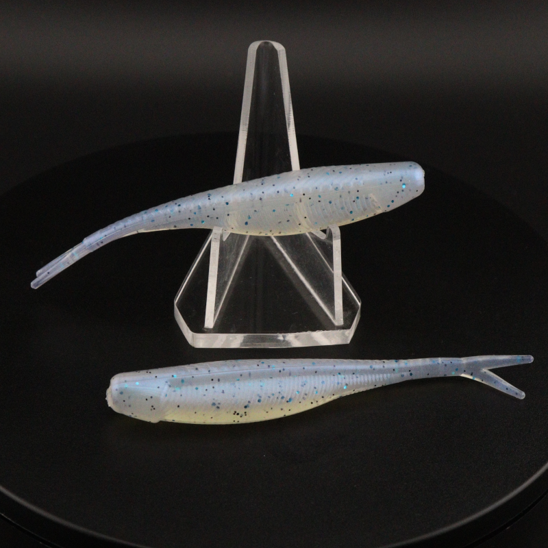3.5-inch soft plastic shiner lure, light blue translucent with blue speckles