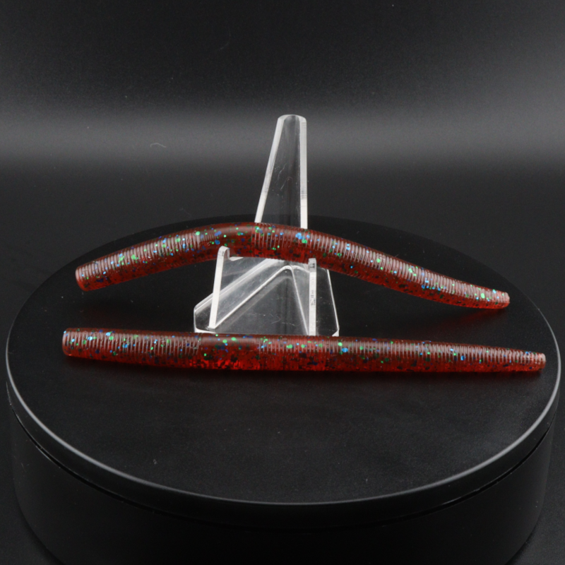 5-inch red glitter stick worm lure with clear display stand