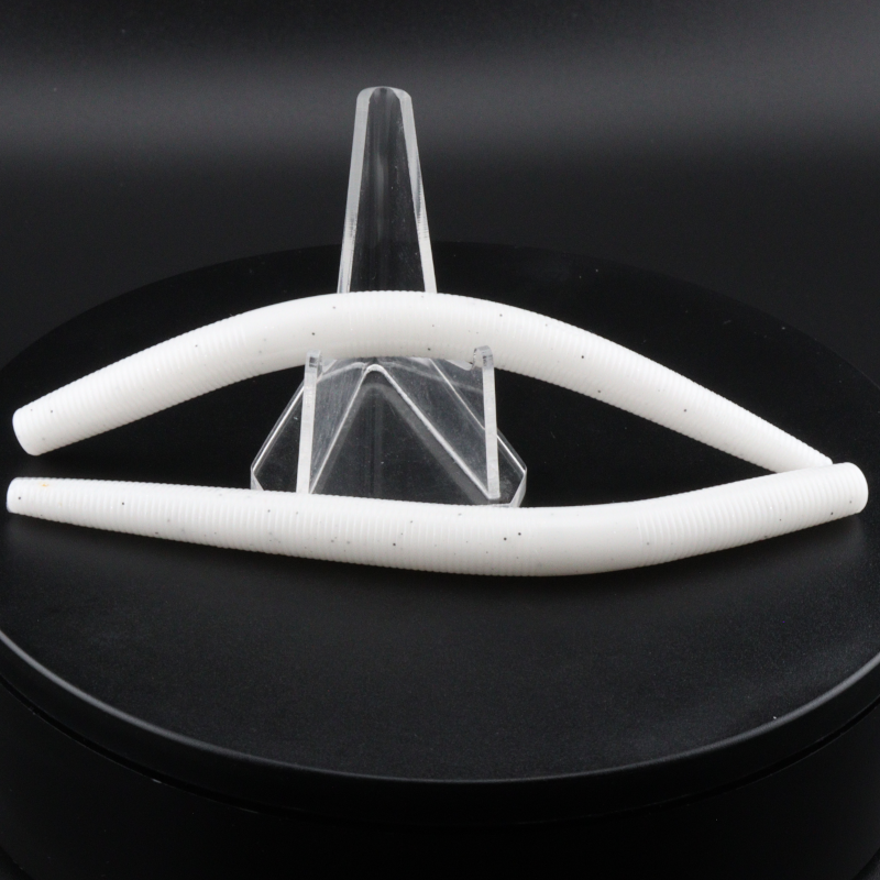 5-inch white stick worm lure on clear display stand