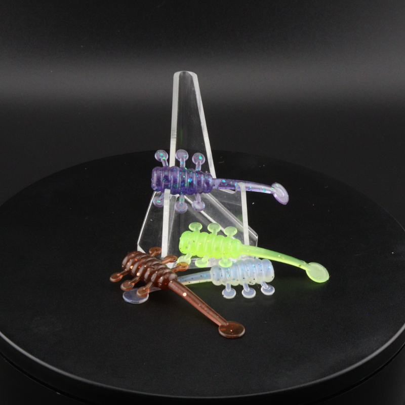2-inch UFO soft plastic paddle-tail lures, green, purple, and brown