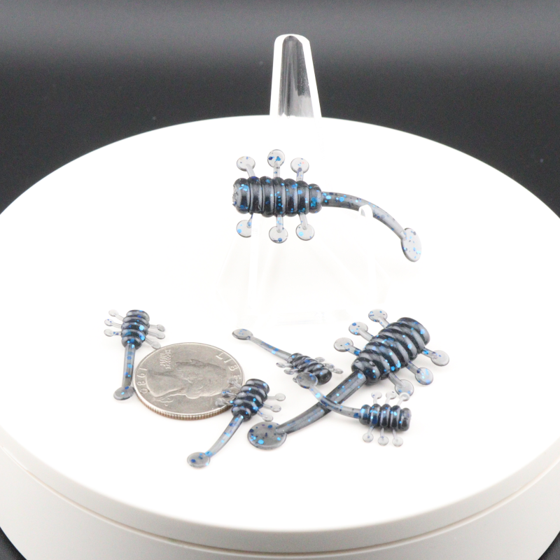 UFO soft plastic fishing lure set in blue-gray, multiple baits with curled legs